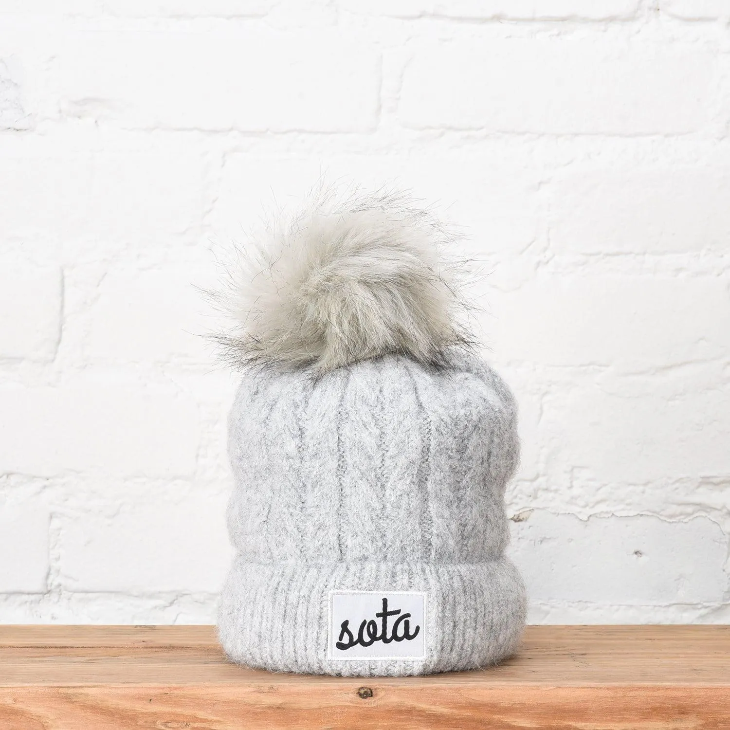 Ridge Line Pom Beanie